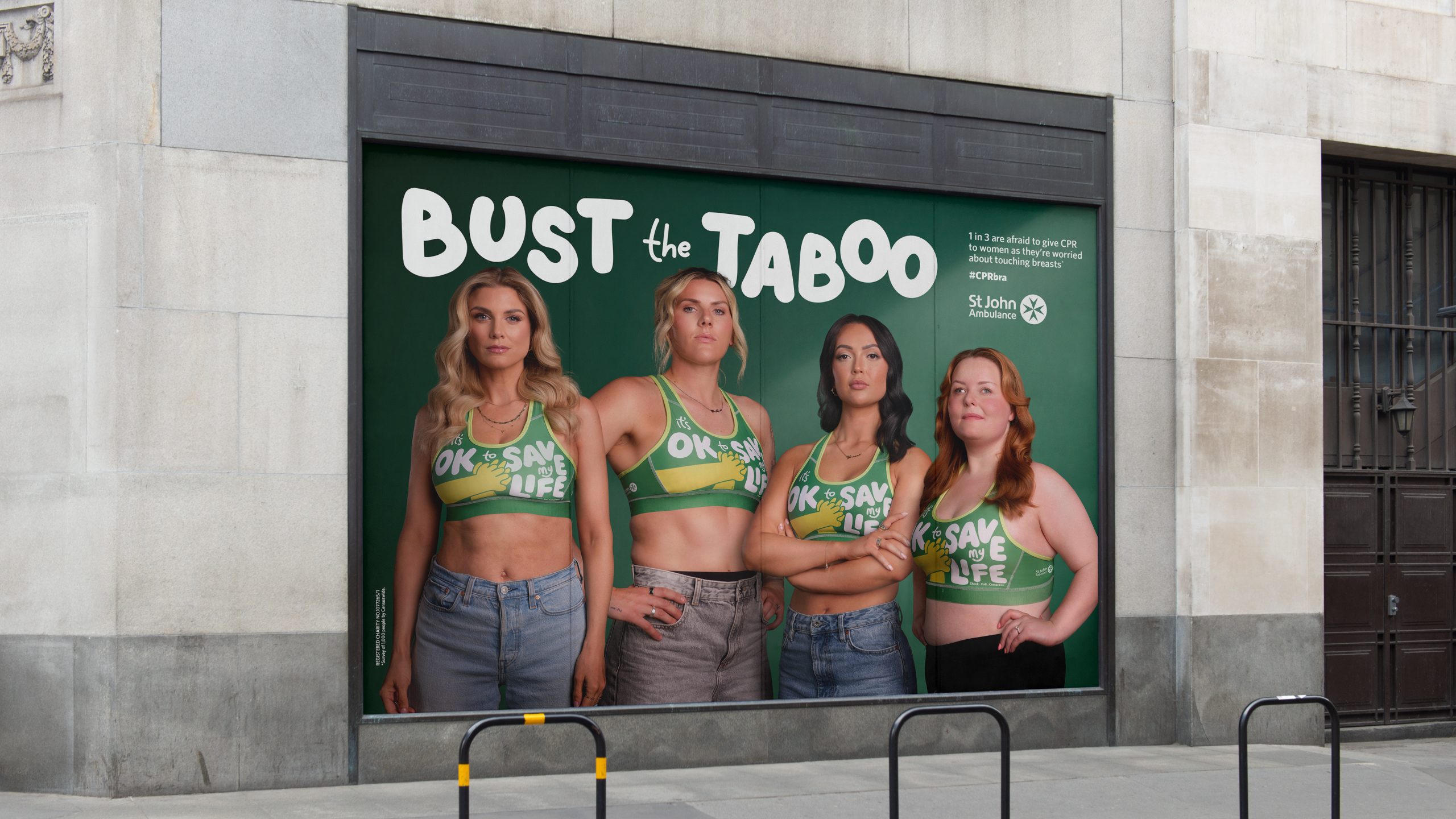 Launching the CPR Bra with St John Ambulance CPR Bra billboard advertisement outside